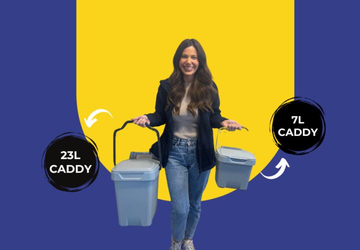 Lady holding plastic caddies for food waste